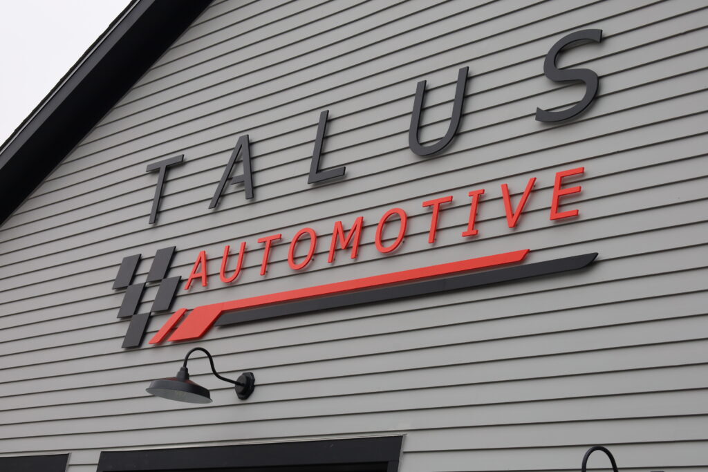 Talus Automotive sign